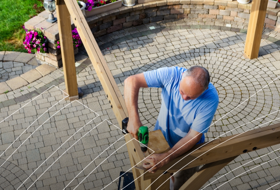 DIYer building a pergola